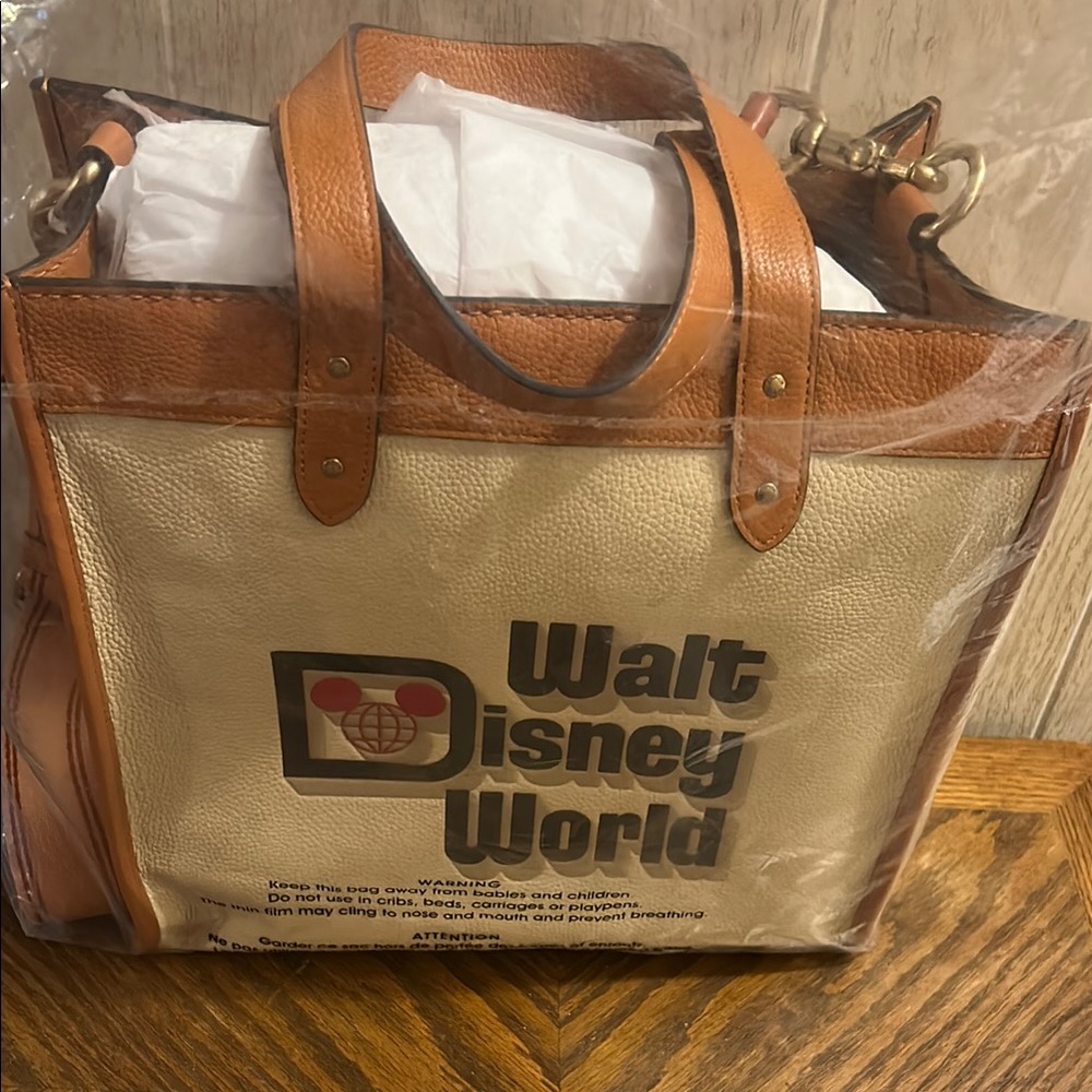 Disney Tan and Brown Tote Bag, Coach.  NWT.  Non smoking, cat friendly home